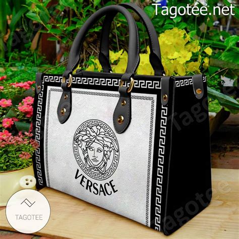 versace clutch malaysia|Versace black and white purse.